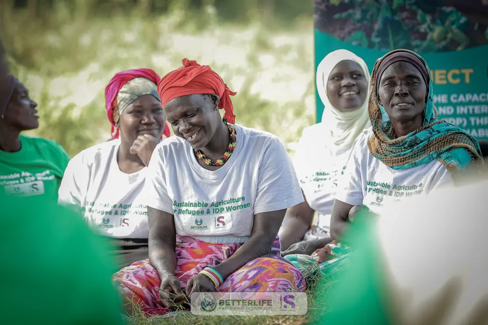 Women laughing together at a programme session