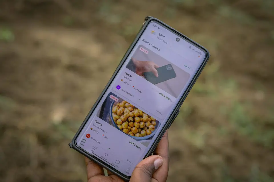 Produce listings in the Agribusiness Connekt app on a phone in Yumbe