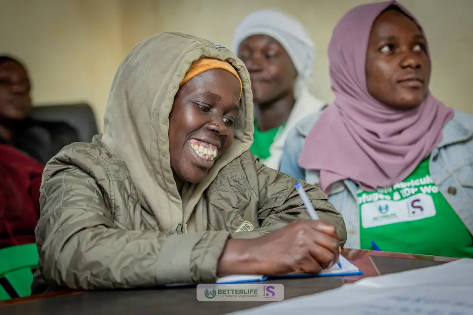 Women taking notes during a training session