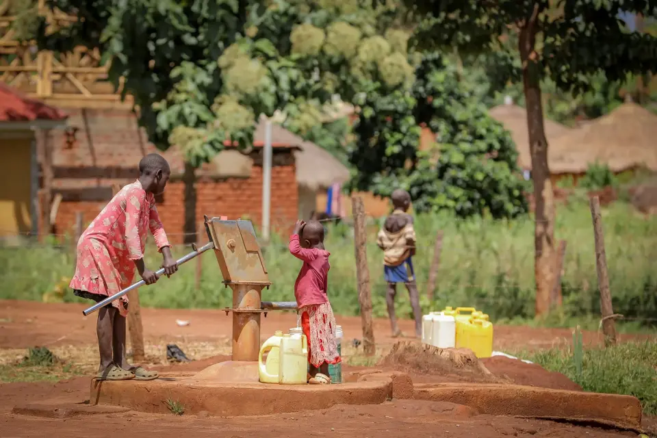 Children fetching water at a borehole