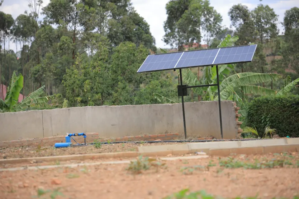 A solar panel above the farm’s water tank