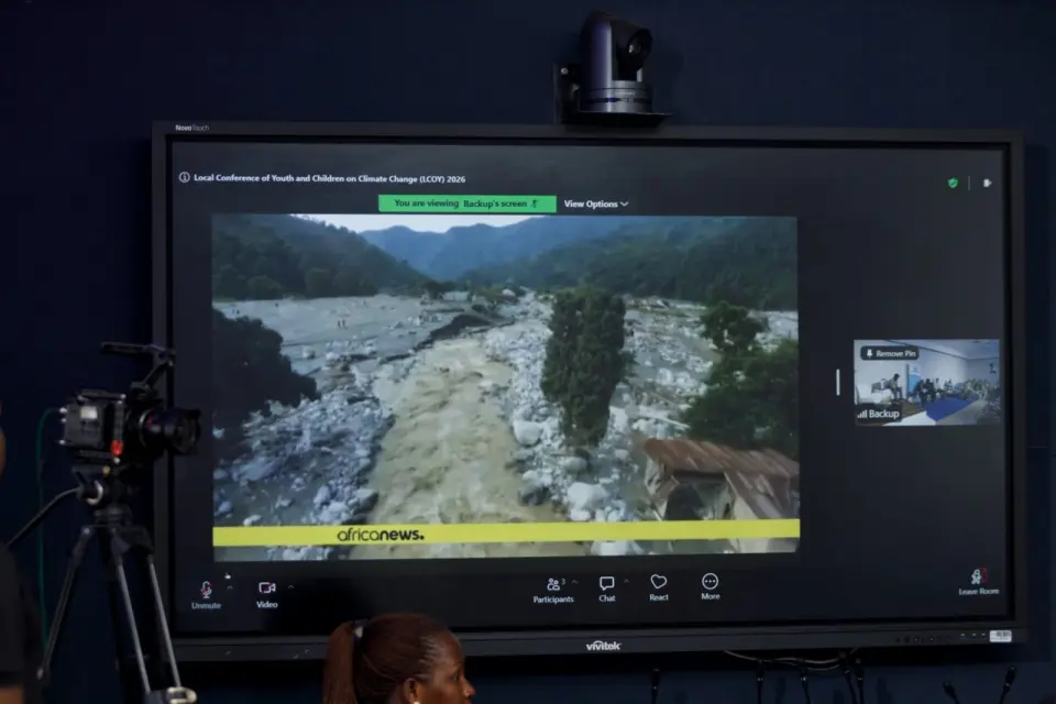 Flood footage on screen during a virtual session at the Local Conference of Youth and Children on Climate Change (LCOY) 2026