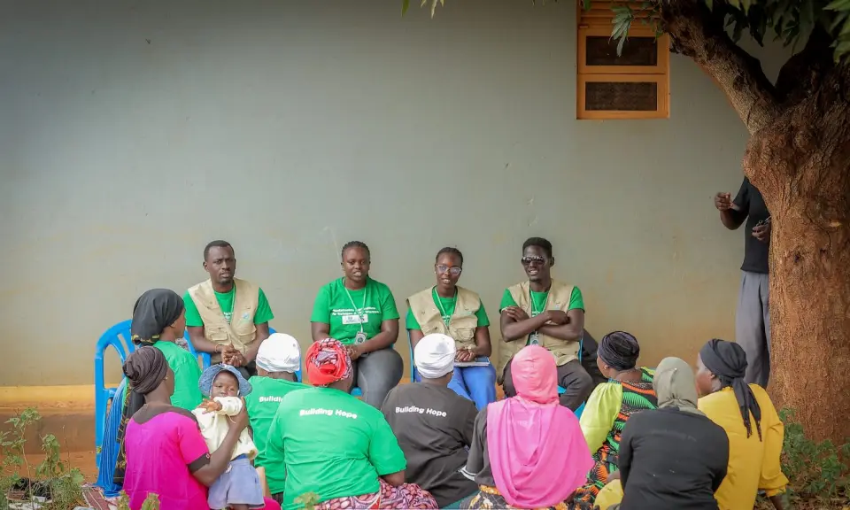 BetterLife team members with a women’s group in Yumbe
