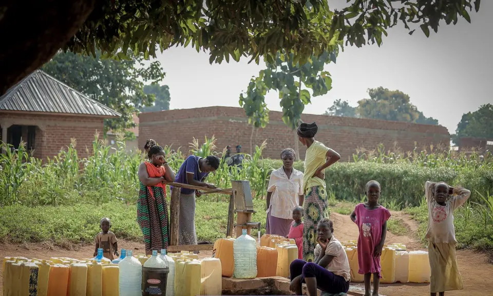 Jerrycans lined up at a water point in Yumbe