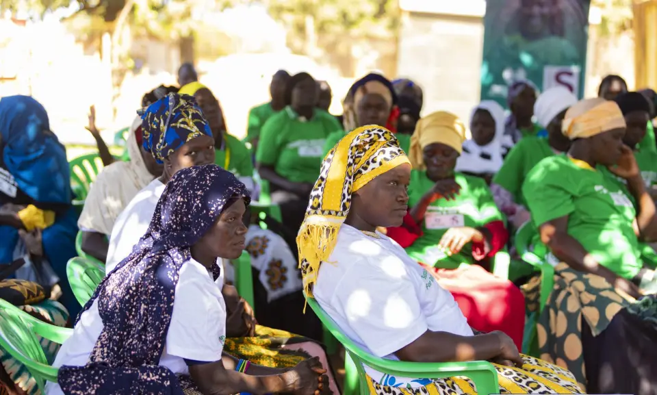 Women in programme T-shirts at a training session in Yumbe